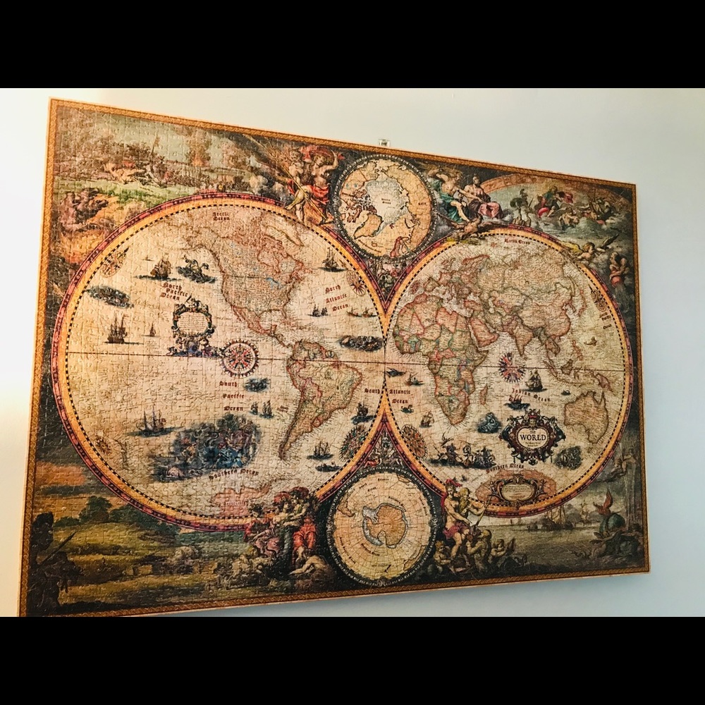 Vintage world art puzzle on a wooden plaque